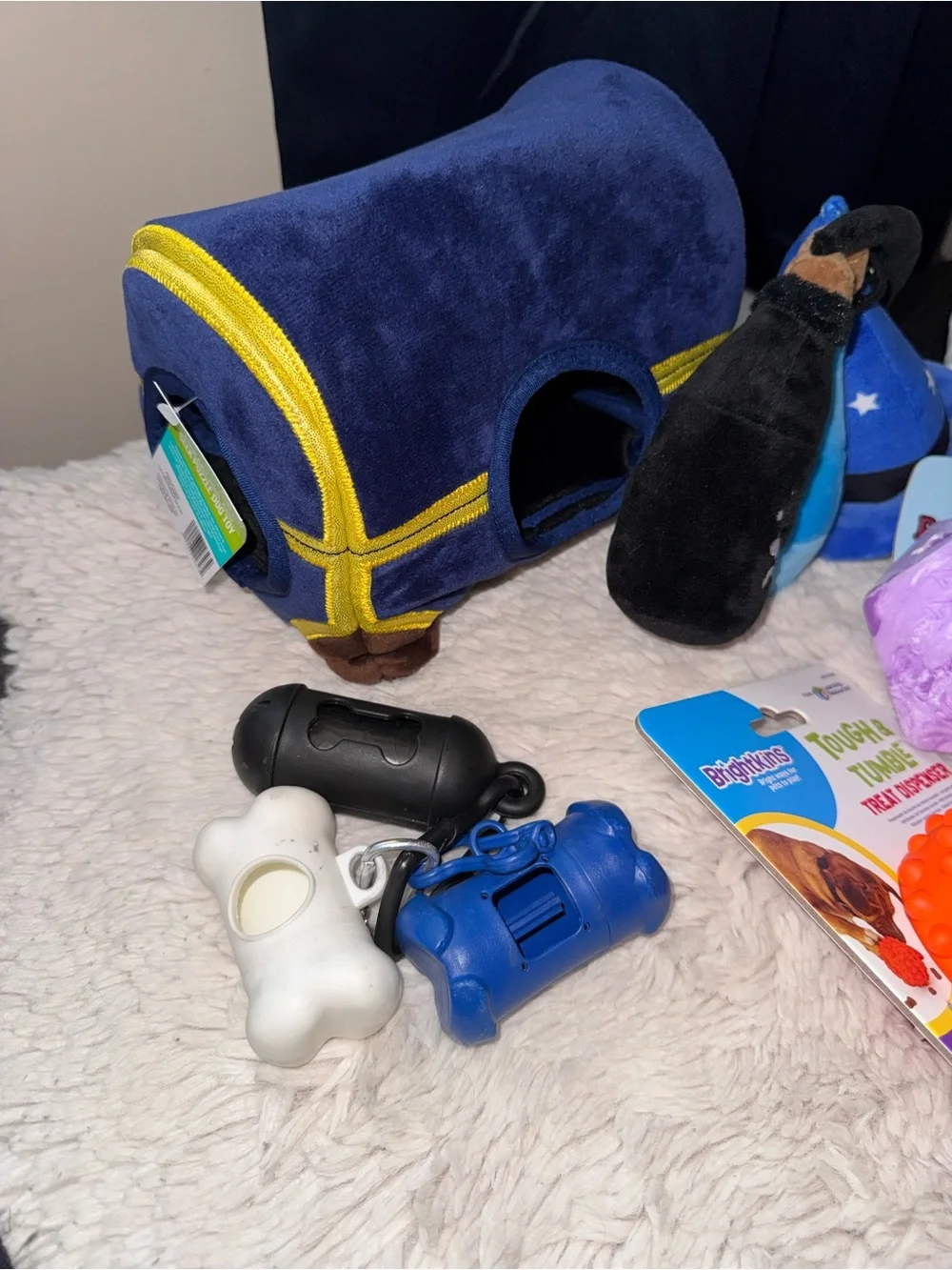 Dog Toys, Treat Dispensers, And Waste Bag Dispensers Bundle